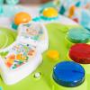 imageBright Starts Around We Go 2in1 Baby Walker Discovery Activity Center and Table Tropic Coral Ages 6 MonthsTropical Cool