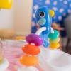 imageBright Starts Around We Go 2in1 Baby Walker Discovery Activity Center and Table Tropic Coral Ages 6 MonthsTropical Coral