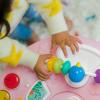 imageBright Starts Around We Go 2in1 Baby Walker Discovery Activity Center and Table Tropic Coral Ages 6 MonthsTropical Coral