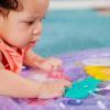 imageBright Starts Disney Baby Stitch Water Mat Making Waves Tummy Time Play Mat 3 Floating Toys NewbornThe Little Mermaid