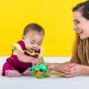 imageBright Starts Oball Musical Toy Jingle ampamp Shake Pal BPAFree EasyGrasp Baby Rattle Toy Ages NewbornGreen