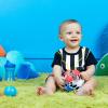 imageBright Starts Oball Musical Toy Jingle ampamp Shake Pal BPAFree EasyGrasp Baby Rattle Toy Ages NewbornRed  White  Blue Soccer Ball