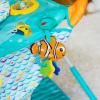 imageBright Starts Pop N Jump Portable Activity Jumper IndoorOutdoor Use Sweet Treats with 4 Sensory Toys Ages 612 MonthsNemo