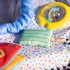 imageBright Starts Pop N Jump Portable Activity Jumper IndoorOutdoor Use Sweet Treats with 4 Sensory Toys Ages 612 MonthsSweets
