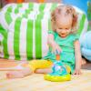 imageBright Starts Press ampamp Glow Spinner Cause and Effect Musical Baby Toy Age 6 MonthsPress  Grow