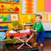 imageBright Starts Tiny Trek 2in1 Baby Activity Walker with Toy Station Adjustable Height and EasyFold Frame Jungle Vines Age 6 MonthsLittle Speedster