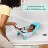 image:imageBright Starts Disney Baby Nemo Foldaway 2Position Baby Bath Seat Adjustable Support for Sink or Bathtub Ages 06 Months up to 20 Pounds MachineWashable SlingNemo