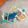 image:imageBright Starts Wild Rainforest Foldaway Activity Gym with Carry Bag for Storage amp Travel Blue Green Jungle Play Gym Newborns amp UpGreen